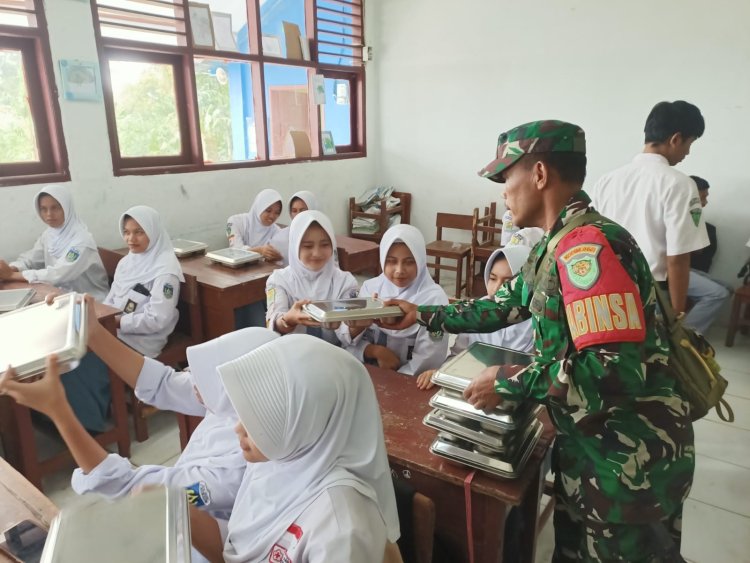Babinsa Koramil 0102/Cadasari Dampingi Penyaluran Makanan Bergizi (MBG) di SPPG Yayasan PRIMA LAND PEDULI UMAT