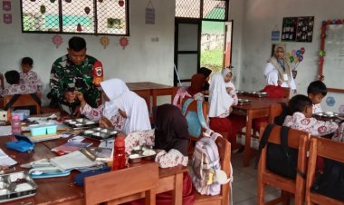 Babinsa Koramil 0105/Mandalawangi Dampingi Pelaksanaan Program Makan Bergizi Gratis (MBG) di Kecamatan Mandalawangi