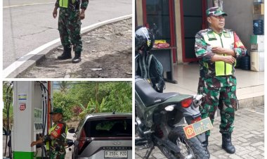 Sertu Sandi S secara Babinsa Koramil 0104/Cimanuk Laksanakan Pengamanan Pasar dan SPBU Cipeucang Jelang Natal 2025 dan Tahun Baru 2026
