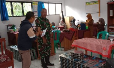 Sertu Taufik Babinsa Koramil 0105/Mandalawangi Laksanakan Pendampingan Program Makan Bergizi Gratis (MBG) di Wilayah Kecamatan Mandalawangi