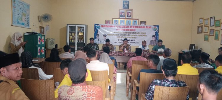 Sertu Sandi S Babinsa Desa Koncang Hadiri dan Dampingi Pelaksanaan Musyawarah Desa (MUSDES)