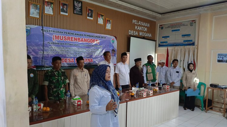 Sertu Rahmat Babinsa Koramil 0103/Banjar Hadiri Musrenbang dan Sertijab PJ Kepala Desa Mogana TA 2026