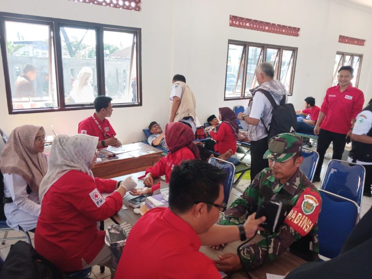 Babinsa Koramil 0116/Cikeusik Monitoring Pelayanan Kesehatan Gratis Meriahkan Hari Jadi ke-152 Kabupaten Pandeglang di Cikeusik